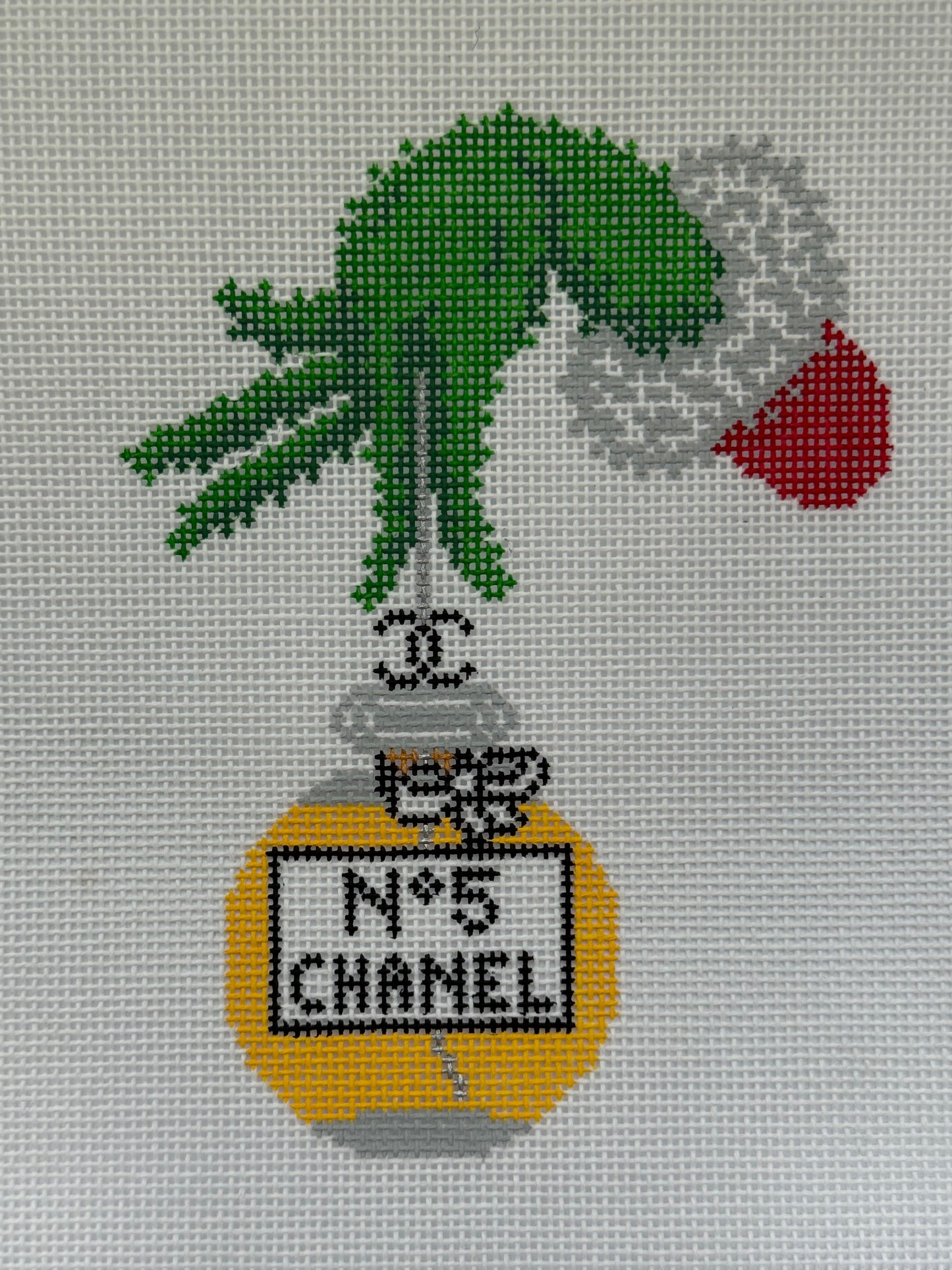 No. 5 ornament with green hand